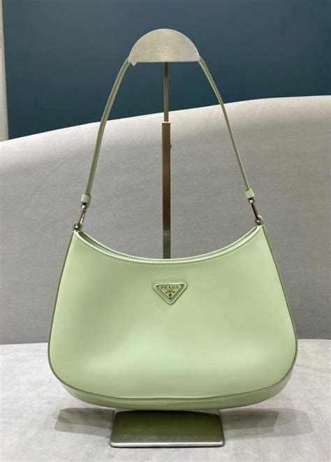 mint green prada bag.